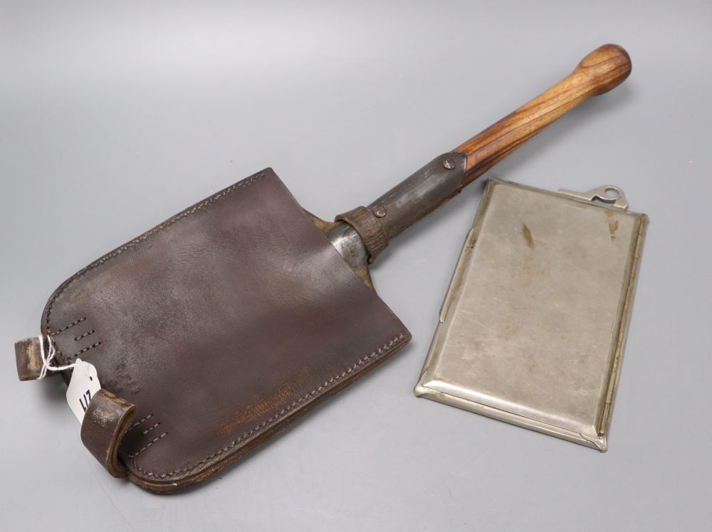 A WWII German Youth shovel, height 51cm, in leather cover and a military mirror